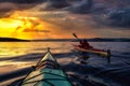 Adventure Man on a Sea Kayak at Sunset Royalty Free Stock Photo