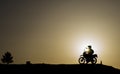 Adventure motorcycle at sunset
