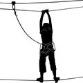 In adventure park rope ladder. Silhouette Royalty Free Stock Photo