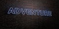 ADVENTURE -Realistic Neon Sign on Brick Wall background - 3D rendered royalty free stock image