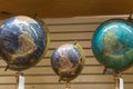 Adventure stories background. Old globe on map background.