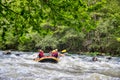 Adventure team doing rafting on the cold waters of the Nestos River