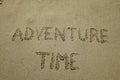 adventure time, happy lifestyle inspirational quote, enjoy the life, text on sand. Say Yes To New Adventures word is written on Royalty Free Stock Photo