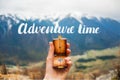 Adventure time lettering words on photo mountain background. Calligraphy mood.