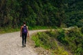 adventure travel photo. tourist on the road of death in bolivia Royalty Free Stock Photo