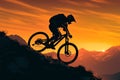 Adventure in twilight silhouette of a mountain biker at sunset Royalty Free Stock Photo