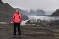 Adventure woman by glacier nature on Iceland. Vatna glacier, Vatnajokull National Park Royalty Free Stock Photo