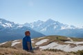 Adventurer is relaxing on the mountain slope Royalty Free Stock Photo