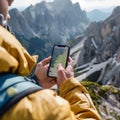 Adventurer Using GPS on Mountain Trail Royalty Free Stock Photo