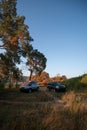 Adventures Camping tourism suv off road cars. Background lake, river an mountains. Landscape outdoor in morning, summer day. Roof Royalty Free Stock Photo