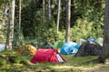 Adventures Camping tourism and tent under the view pine forest landscape near water outdoor in morning and sunset sky at Pang-ung Royalty Free Stock Photo