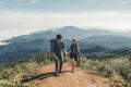 Adventures Couple trail hiking in the forest