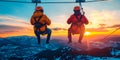 Adventurous couple zip-lining through lush forest canopies on a nature excursion during their summer vacation Royalty Free Stock Photo