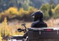 Adventurous driving of ATV motorbikes. A man drives a quad bike on dangerous roads