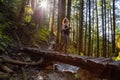 Adventurous Girl Hiking in a Green and Vibrant Rain Forest Royalty Free Stock Photo