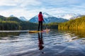 Adventurous Girl Paddle Boarding on Levette Lak