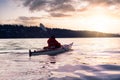 Adventurous Man Sea Kayaking in the Pacific Ocean. Royalty Free Stock Photo