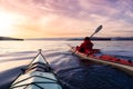 Adventurous Man Sea Kayaking in the Pacific Ocean. Royalty Free Stock Photo