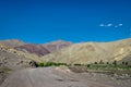 Adventurous road through mountains with clear blue sky on Manali to Leh highway in India