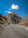 Adventurous road through mountains with clear blue sky on Manali to Leh highway in India