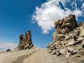 Adventurous road near summit at Khardung La pass with clear blue sky on Manali to Leh highway in India