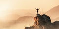 Adventurous Woman Hiking on the Rocky Coast with Mountains and Dramatic Sunset Sky.