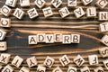 Adverb - word from wooden blocks with letters Royalty Free Stock Photo