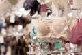 Advertise, Sale, Fashion concept - Close up of woman`s hand choosing underwear on hangers in the supermarket