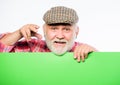 Advertisement shop. Senior bearded man place announcement on banner. job search. help. smiling mature man in retro hat