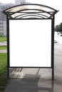 Advertisers place on bus shelter Royalty Free Stock Photo