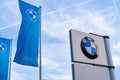 Advertising banners, flags of German automotive concern BMW Group, concept Advertising and Marketing in Automotive Industry,