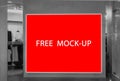 Advertising Billboard mockup panoramic banner with red light box showcase in department store,display space for text design Royalty Free Stock Photo