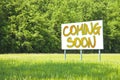Advertising billboard with written `Coming Soon` on it Royalty Free Stock Photo