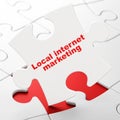Advertising concept: Local Internet Marketing on puzzle background
