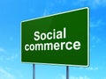 Advertising concept: Social Commerce on road sign background