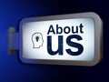 Advertising concept: About Us and Head With Lightbulb on billboard background Royalty Free Stock Photo