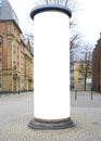 Advertising pillar in a city with free copy space