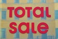 Advertising sign on the store total sale