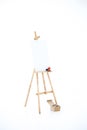 Advertising stand or flip chart or blank artist easel isolated on white Royalty Free Stock Photo
