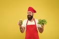 Advertising your product. healthy eating and diet concept. cook hold fresh salad and smoothie in bottle. organic eco Royalty Free Stock Photo