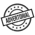 ADVERTORIAL text written on black vintage round stamp Royalty Free Stock Photo