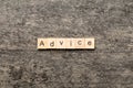 Advice word written on wood block. Advice text on table, concept Royalty Free Stock Photo