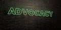 ADVOCACY -Realistic Neon Sign on Brick Wall background - 3D rendered royalty free stock image