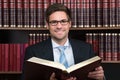 Advocate Reading Book At Courtroom