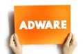 Adware - unwanted software designed to throw advertisements up on your screen, text concept on card