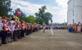 Boys and girls are enrolled in the first class and receive gifts from high school students at the school`s official line on knowl