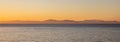 Aegean sea and Attica Greece hills, view from Kea island at sunset time, clear sky background, banner Royalty Free Stock Photo