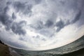 Aegean sea, beach and sky with clouds before the storm Royalty Free Stock Photo