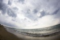 Aegean sea, beach and sky with clouds before the storm Royalty Free Stock Photo