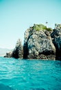 Aegean sea coast with small lighthouse Royalty Free Stock Photo